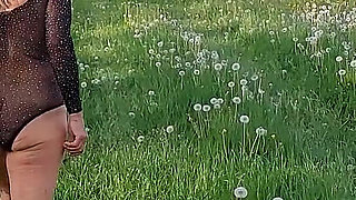 Mature Woman Is Walking Around Outside in a See-through Bodysuit!