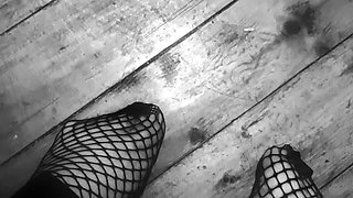 Teen in fishnet socks