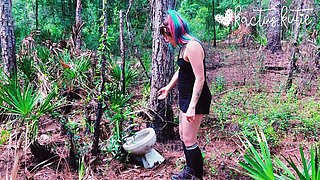 Peeing on a Toilet in the Woods