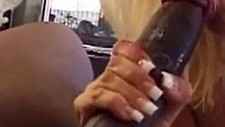 A Slutty Blonde Gives a Blowjob to a Huge Black Monster Cock!