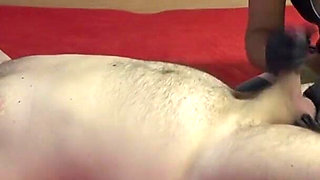 Latex Danielle and her training slaves with a long cumshot fountain