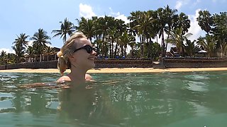 Lovita Fate shows off her slim body in a bikini by the pool