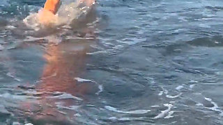 Try Not to Wet My Hair While Play with the Waves