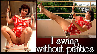 Beutiful lady swinging without panties on a swing outdoors. Slow motion 127 f