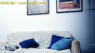 Cute amateur asian web cam girl playing with her toy