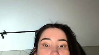 Small titted brunette teen fingering on the bed