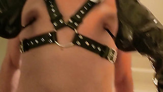 Mistress Digs the Heels of Her Boots Into Her Slave