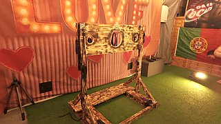 BDSM Mistress Pegging Her Slave in the Stocks with a Huge Strapon