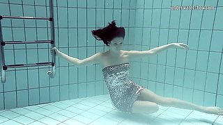 Naked Russian mermaid in the pool