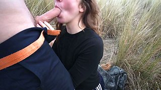 Outdoor handjob on beach with cumshot