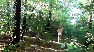 Redhead Amateur Shows Off Her Big Booty in the Forest