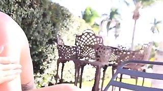 Chick gets oiled and drilled hard by pool