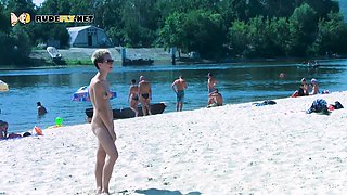 Hot nudist girl filmed by a voyeur