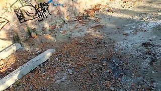 Naked teen girl walks in an abandoned building