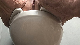 She's Enjoying Rubbing Her Pussy on the Toilet