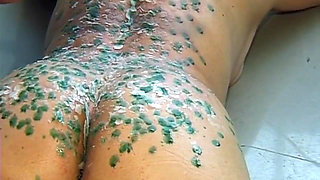 Mature MILF Enjoys Hot Wax Dripping Across Her Ass
