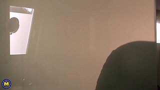 Busty housewife messing around in a public restroom - Margitta
