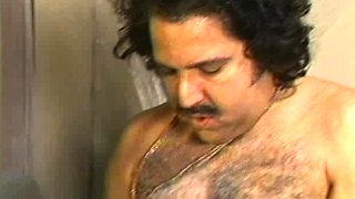 Busty curly brunette with big boobs fucks on couch