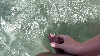 Girl helps to hold the dick while peeing public