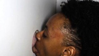 Black Amateur On Her Knees Sucking Off Stranger Through Hole