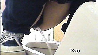 Cute amateur asian web cam girl playing with her toy