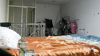 Cute amateur asian web cam girl playing with her toy