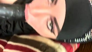 Big breasted Arab milf having fun with a black toy on webcam