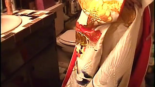 Man shoves cock in asian's mouth while she lays in bed