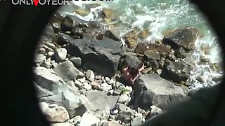 Beach Voyeur. Horny teen chick rides her boyfriend on the beach