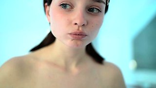 Amateur young brunette enjoys dildo on solo masturbation