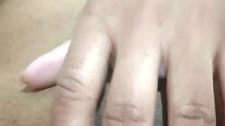 Masturbating