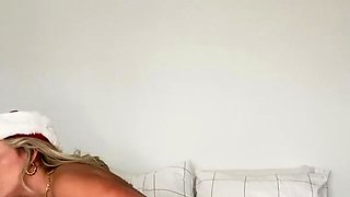 Blonde teen in solo action with her pussy