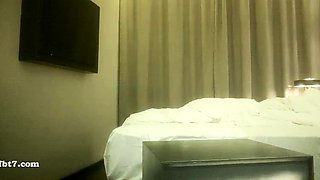 Cute amateur asian web cam girl playing with her toy