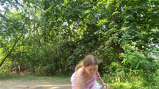 Cute Teen in Costume Playing in the River Like in a Swimming Pool