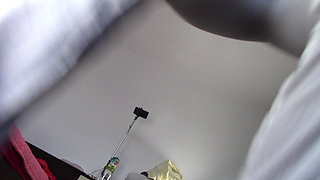 Amateur wife dancing naked at home. Amateur woman has fun trying on clothes and cutting them
