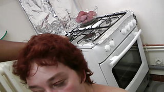 Mature fucked in the kitchen by a big black cock