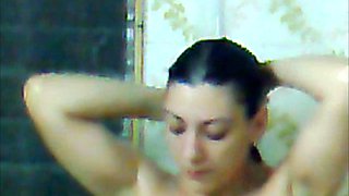 Wife in the bathroom washing her beautiful strong torso