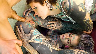 Inked sluts share massive dick for anal threesome