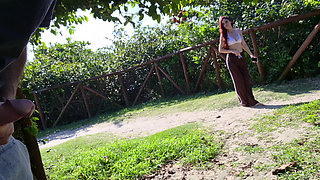 Risky handjob for hot redhead on the walk in the park in public!