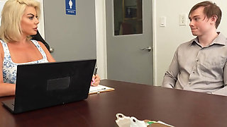 Blonde business MILF fucks a younger client in the office