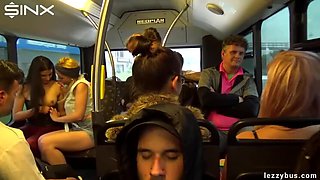 Lesbian Couple with Tattoos Having Fun on Bus