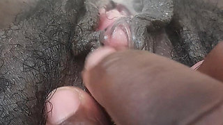 German black fat hairy wet  Pussy with big clit closeups