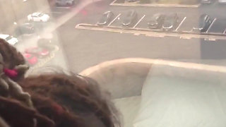 Giving Backshots While Looking Out of 12th Story Hotel